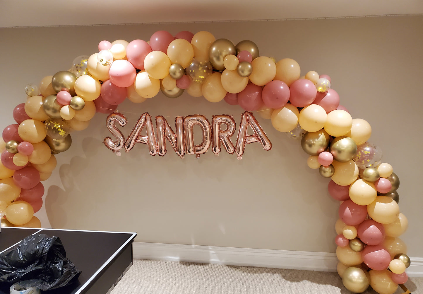 Half circle gold arch rental
